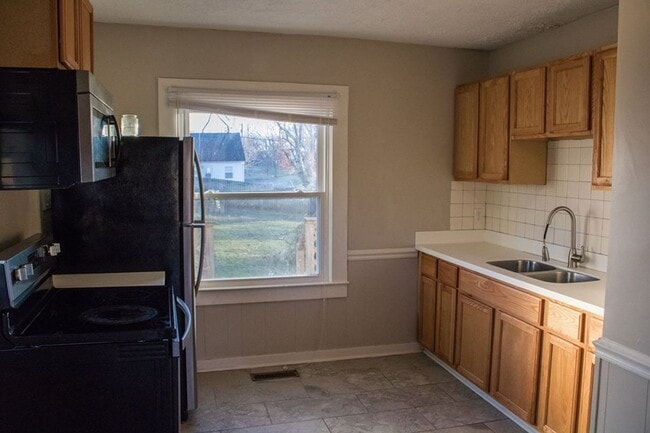 Photo - AVAILABLE NOW. $1300 PER MONTH. NEW STAINLESS STEEL APPLIANCES and UPDATES!!