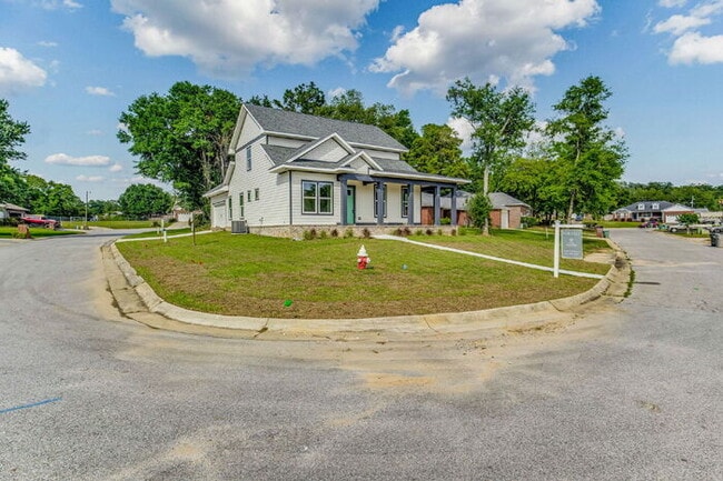 Building Photo - This luxurious new custom home in the sought-after Shadow Grove subdivision is a masterpiece of m...
