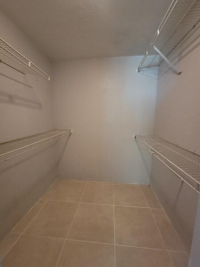 Photo - 104 Palm Beach Trace Dr Unit 104