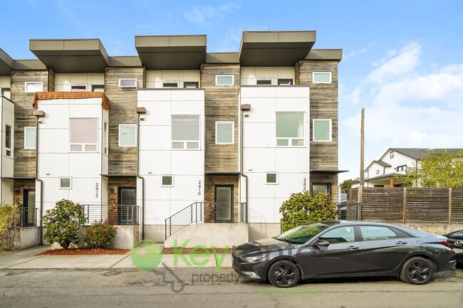 Photo - **Rent Special** Modern Two Bedroom Townhome with Designated Parking