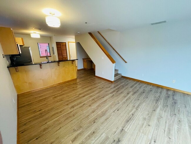 Photo - Top Floor 1bdrm Condo with River Views and Private Deck | FREE reserved parking Included! Unit D5