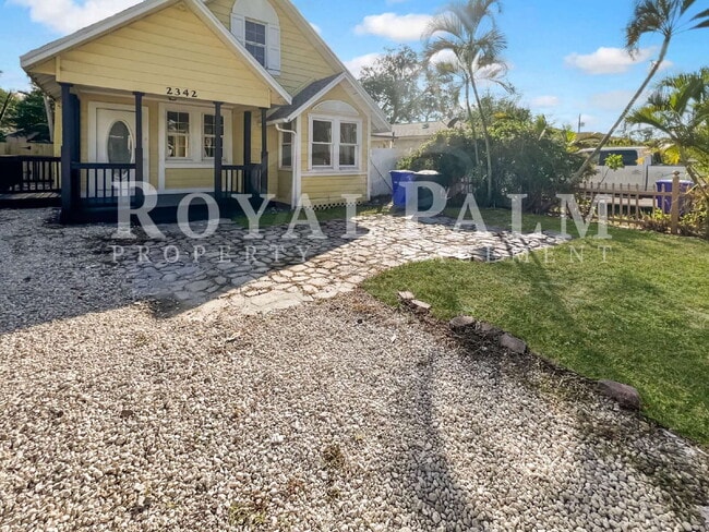 Photo - Deck the halls or the French doors, because this charming century-old single family home is avail...