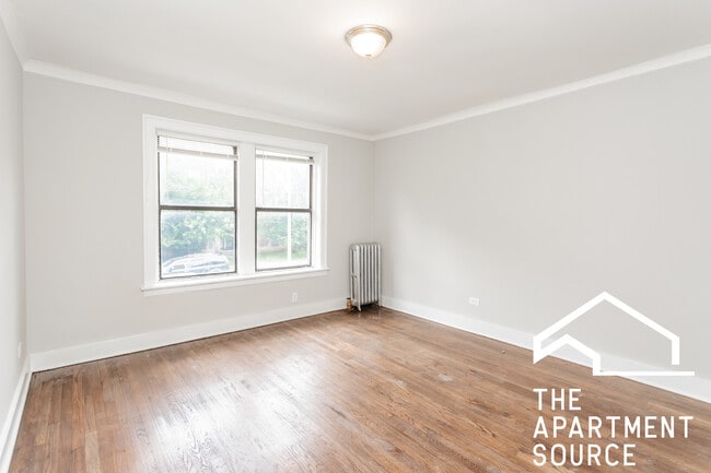 Building Photo - 6959 S Paxton Ave Unit 3E