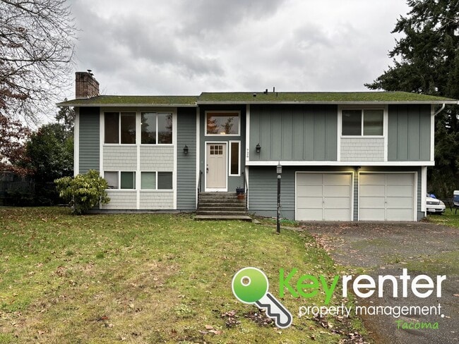 Building Photo - Split level 3 Bed 2 Bath Upstairs Unit with Modern Upgrades Close to JBLM!