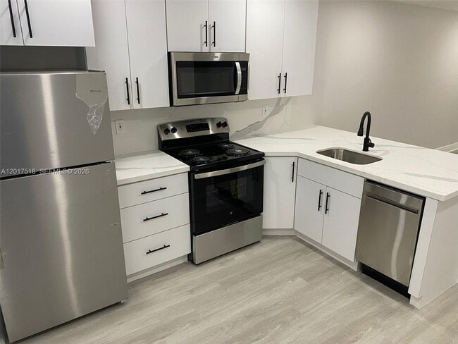 Building Photo - 4650 W Flagler St Unit 3