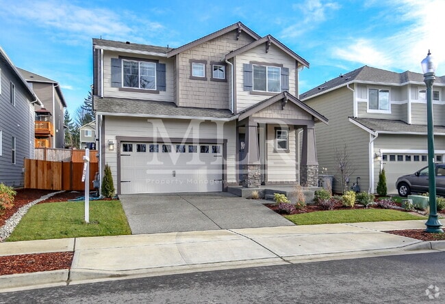 Building Photo - Elegant 4BR Covington Rental with Chef’s K...