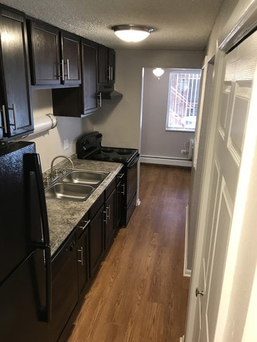 Building Photo - Garden Center Apartments