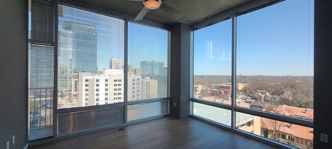 Photo - Modern Corner Unit 1BR Condo in Midtown with Skyline Views