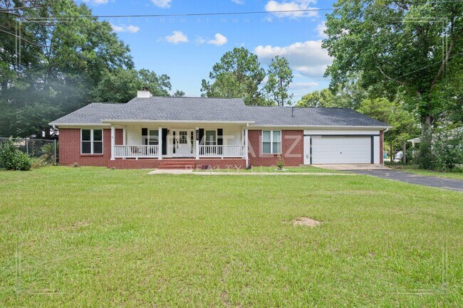 Photo - Beautifully Updated 3-Bedroom Home with Fenced Yard & Double Garage!