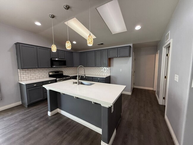 Photo - Beautiful 4 Bedroom, 3 Bathroom Home with Enclosed Patio & Stunning Backyard