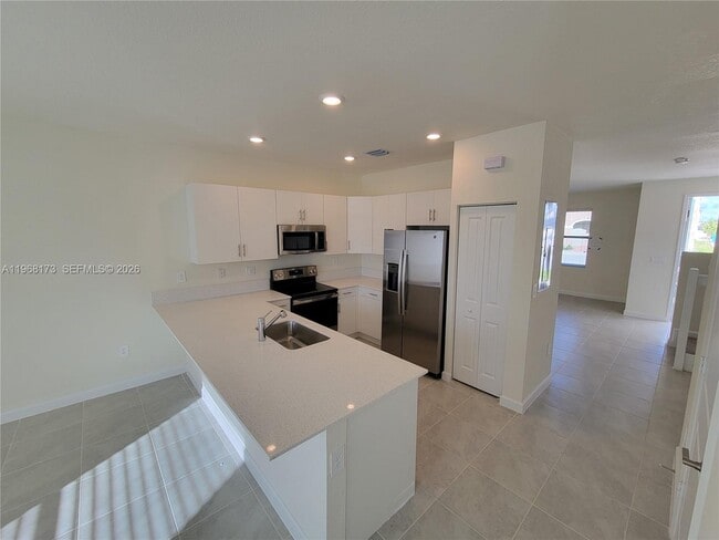 Photo - 11404 West 33rd Ct