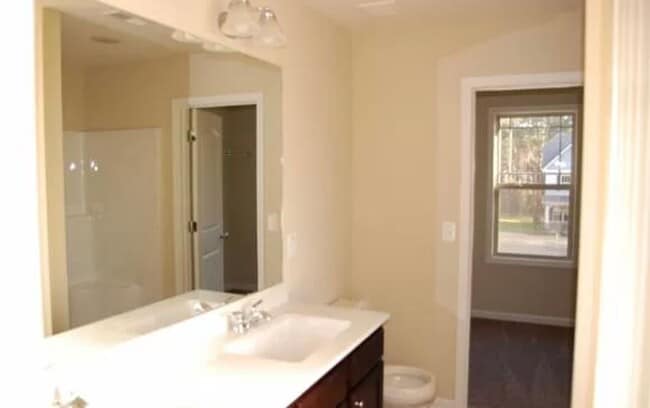 Photo - Spacious 4-Bedroom Home with Bonus Room in...