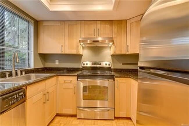 Photo - Freshly Updated 3BR Condo w/ Cozy Fireplace, Deck & 2 Parking