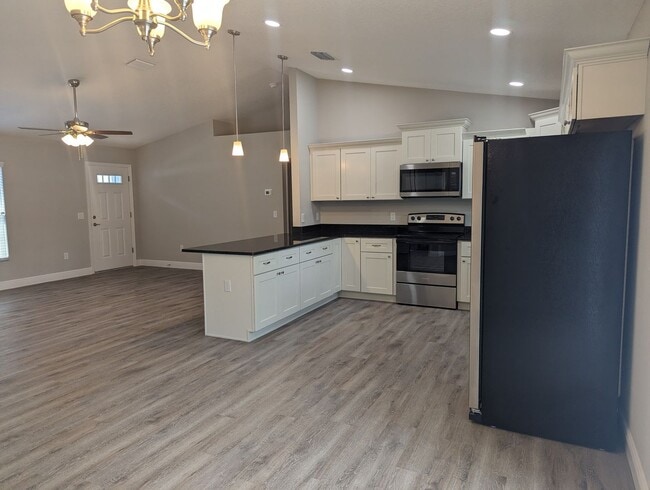 Photo - New 3/2/2 fenced home with Many Upgrades i...