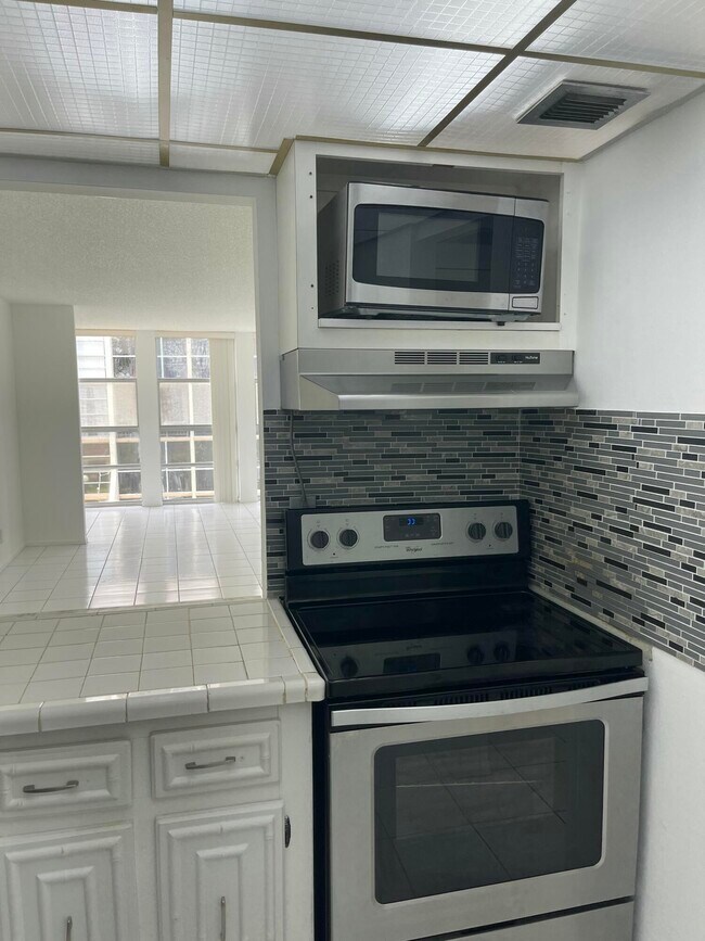 Photo - 801 Three Islands Boulevard Unit 306