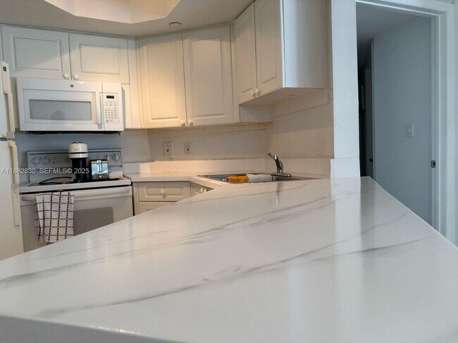 Building Photo - 8911 Collins Ave Unit 203