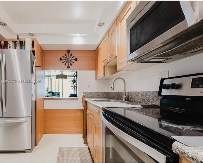 Building Photo - 8300 Sands Point Blvd Unit K106