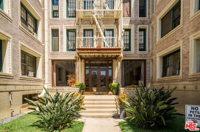 Building Photo - 2121 James M Wood Blvd Unit 415 Rental