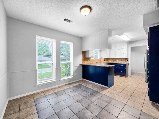 Photo - Coming Soon! 4 BR/2BA | Newly Renovated Single Family Home | 1-Car Garage Parking | Covered Patio...
