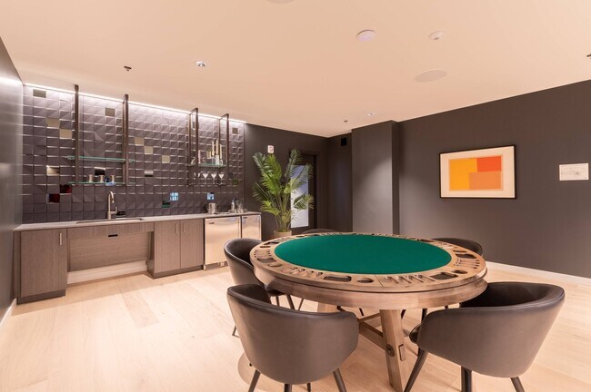 Play a round of poker in the Game Lounge