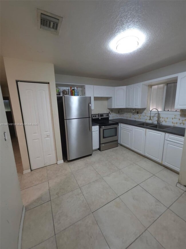 Building Photo - 1465 NW 59th St Unit 1465 Rental