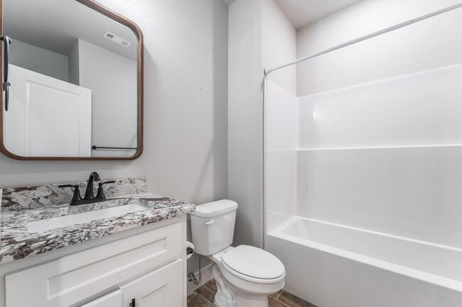 Photo - Welcome to this stunning 3-bedroom, 2-bathroom home that boasts a range of high-quality features ...