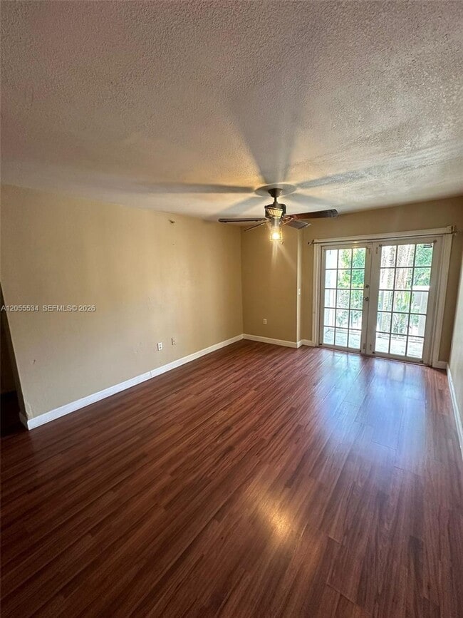 Building Photo - 5035 Wiles Rd Unit 203
