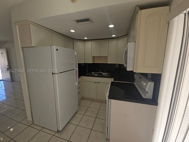 Photo - 1560 W 46th St Unit 244