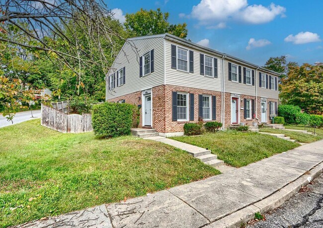 Photo - Updated End-of-Group Townhome with Finished Lower Level, Fenced Yard & Community Pool