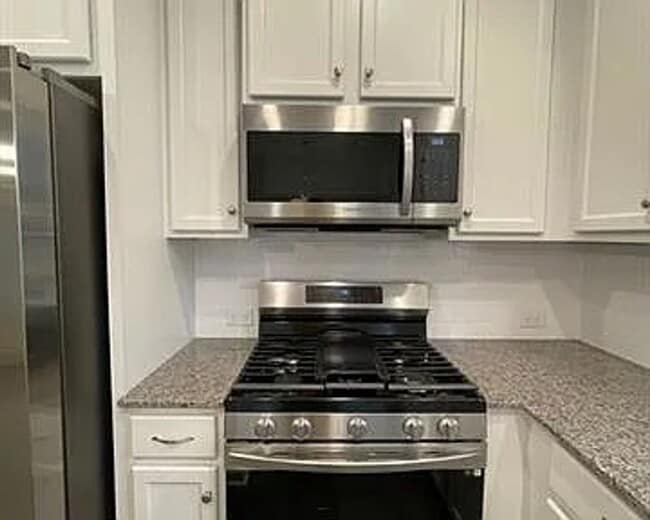 Photo - 3 BR/2BA | 1-Car Garage | End-Unit