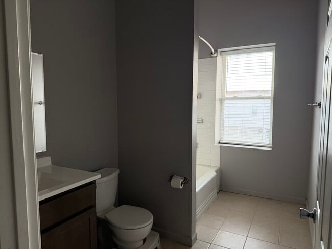 Spacious Bathroom. - 101 E Saint Louis St Unit 1A