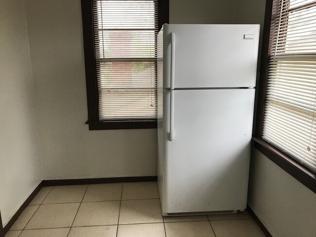 205 1/2 West 61st St.