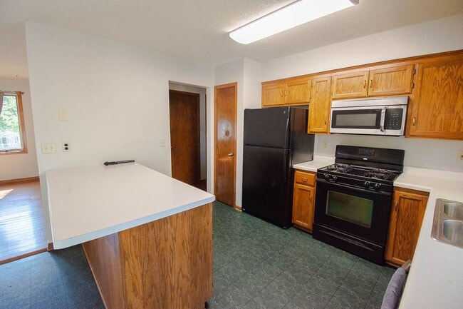 Photo - NW Rochester Split-Level with Vaulted Ceilings & Detached 2-Car Garage
