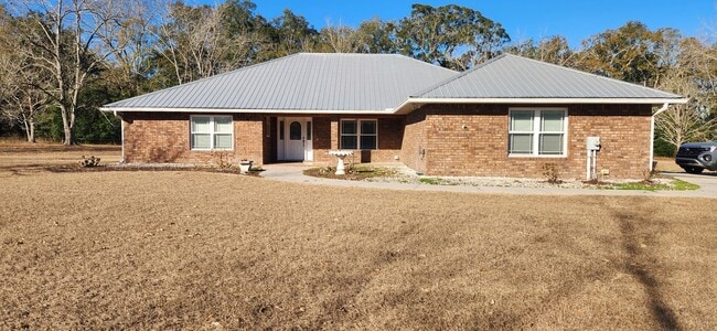 Building Photo - Beautiful 3BR/2BA Home with Oversized Garage on 1 Acre in a Peaceful Country Setting