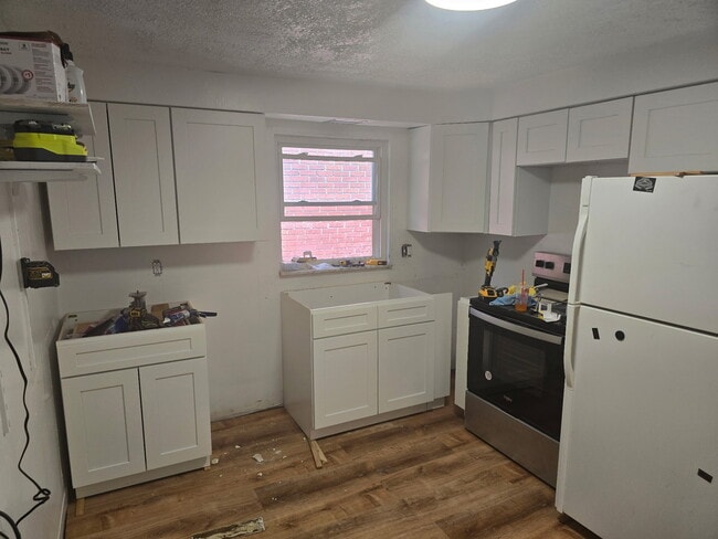 Building Photo - 1128 Arkansas Ave Unit 2