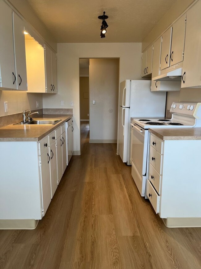 Photo - 2 Bed • 1 Bath Upstairs + Mini Storage - Updated Flooring Unit 3404-08