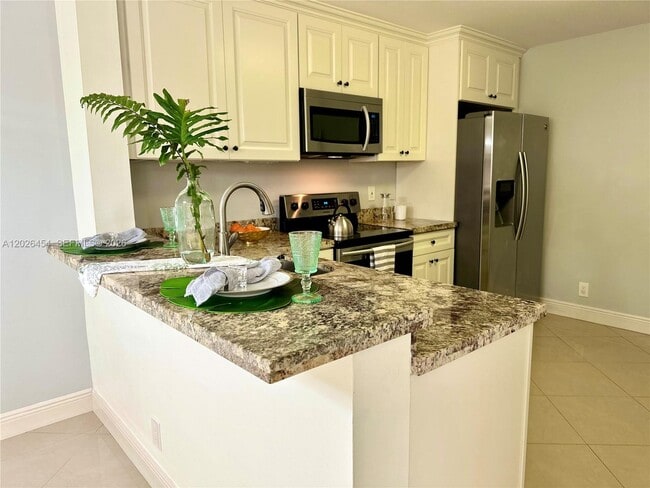 Building Photo - 10141 W Sunrise Blvd Unit 203