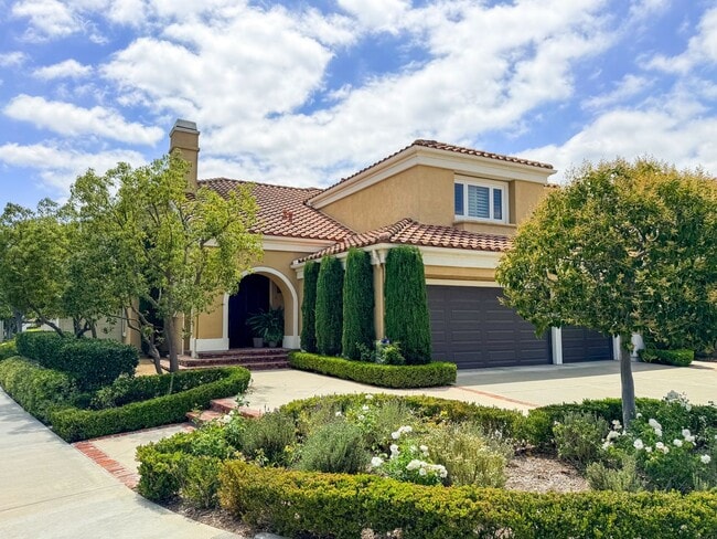 Building Photo - Elegant Mediterranean Living with Private Pergola Garden & Resort Amenities