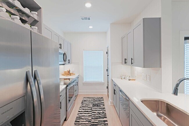 Photo - Get Up to $2,400 Off Your 2/2 Rent! Unit SK1