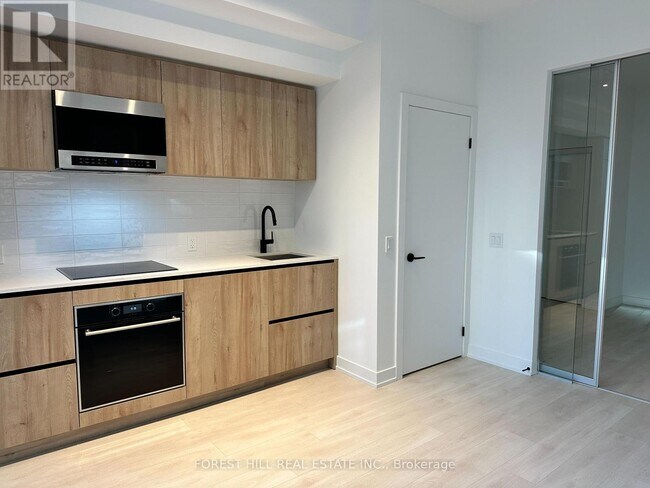 Photo - 117 Broadway Ave Unité 208