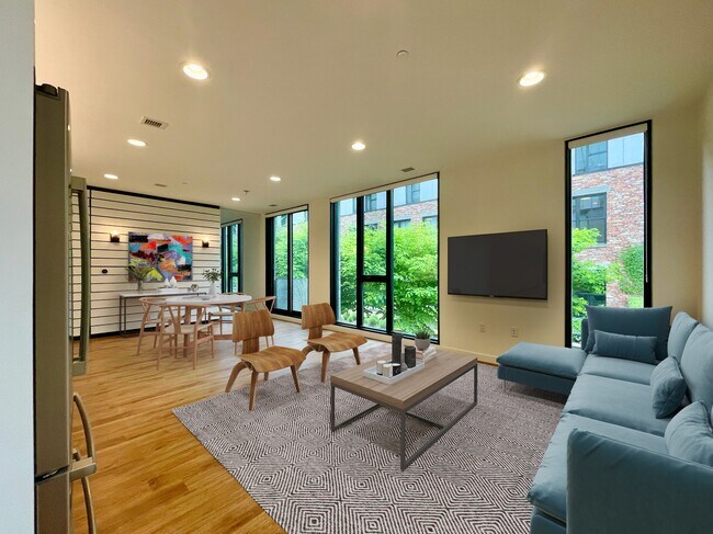 Living / dining room with view of courtyard - 57 N St NW Condo Unit 234