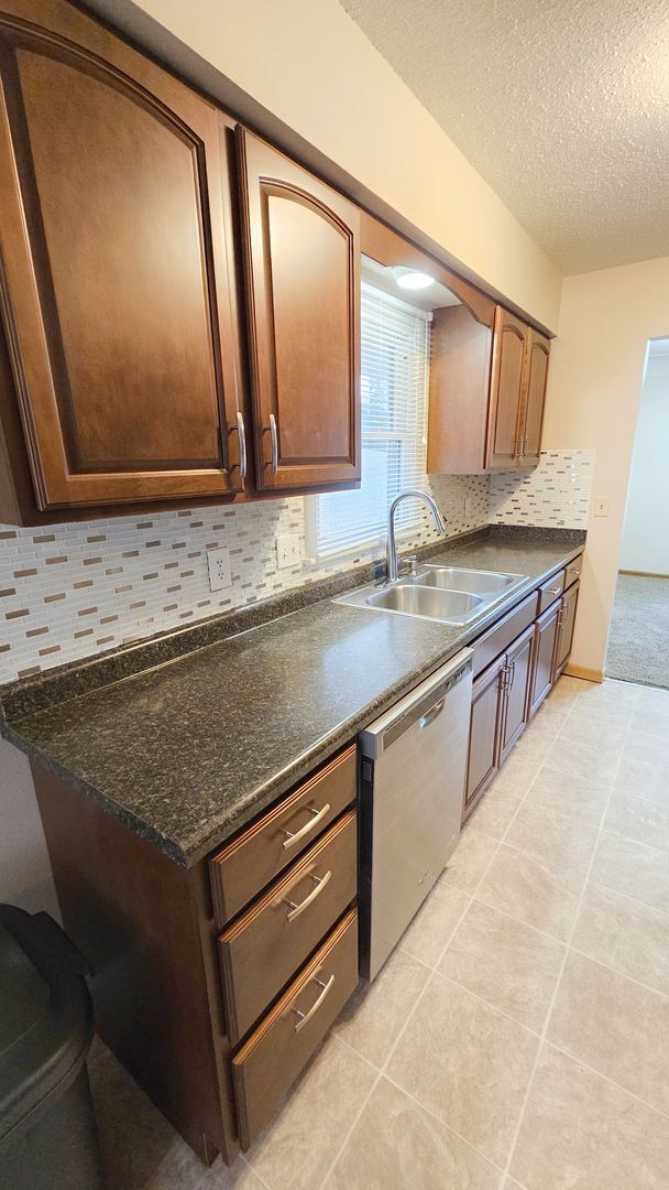 Photo - Charming & Updated 3-Bedroom Home with Sunroom, Fireplace & Garage