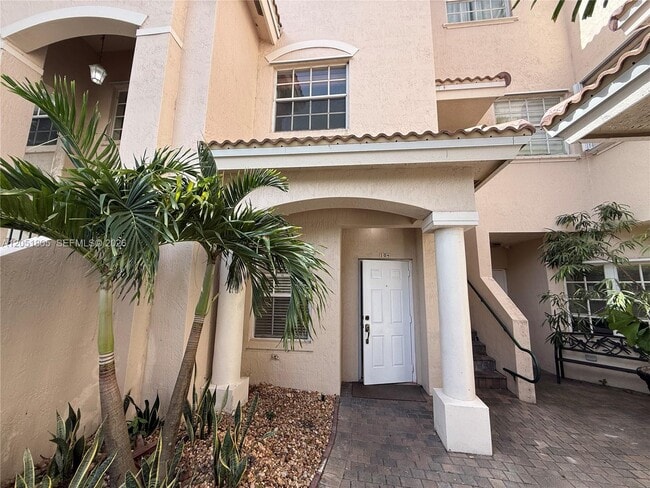 Building Photo - 5670 NW 116th Ave Unit 104