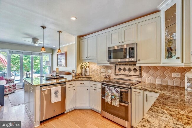 Photo - Experience elevated living in this beautifully renovated townhome nestled within the highly sough...