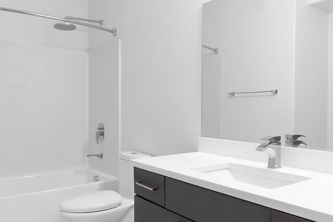 Bright and thoughtfully-designed bathrooms made for daily ease.