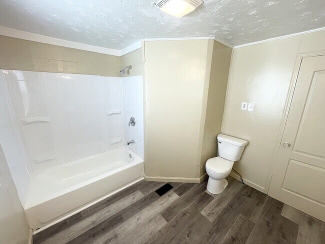 Photo - 4 bedroom HUGE attached, 2-car garage/workshop combo (has electricity