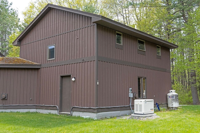 Back of apt with 3 back windows, stairwell window & garage side door (left) - 64 Gardner Rd Unit A
