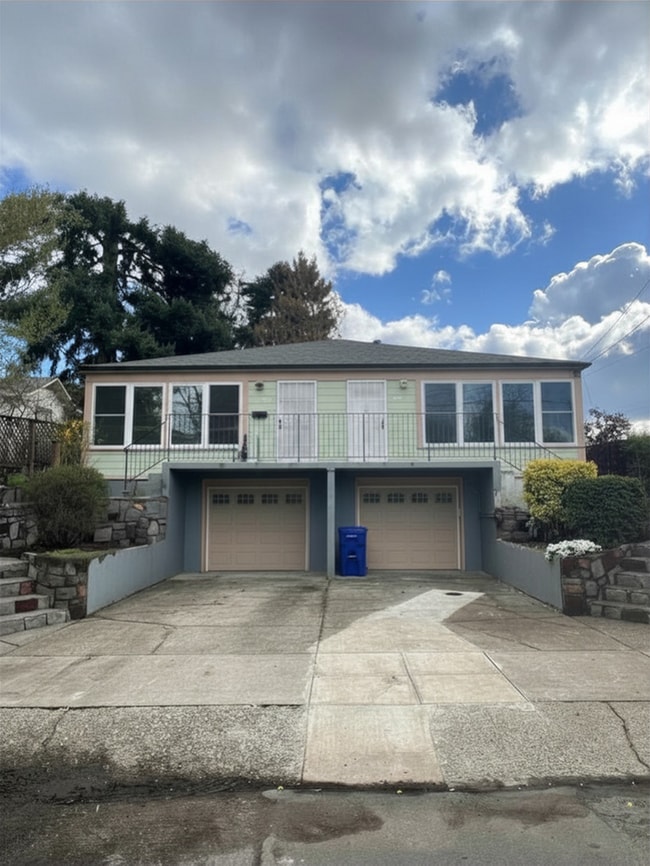 Building Photo - Your Mt. Tabor Oasis: Huge Yard, Oversized Shop-Garage & Sun-Drenched Living!