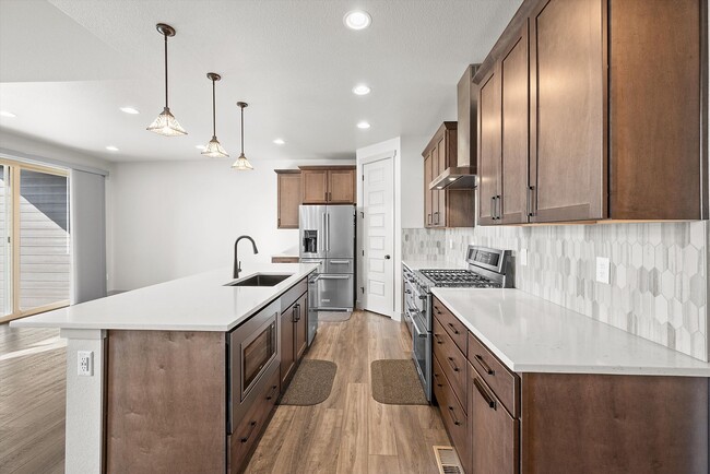 Photo - New-Build Paired Home with Dual Primary Suites, Finished Basement & Mountain Views