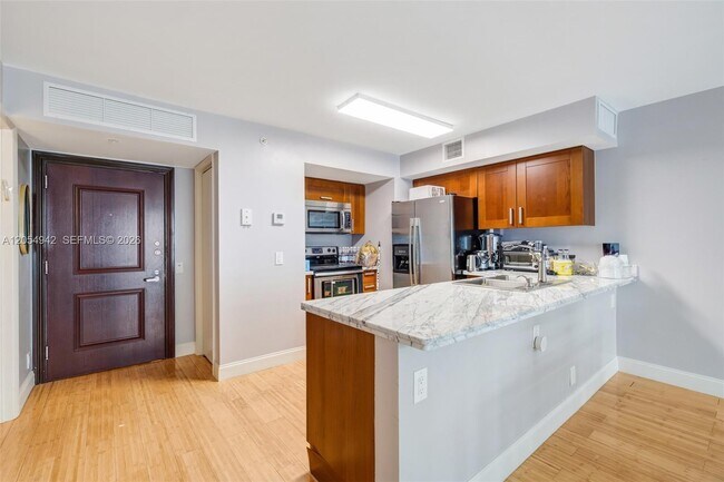 9499 Collins Ave Unit 607